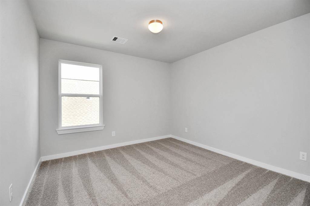 Sample photo of completed home with similar floor plan. Actual colors and selections may vary.