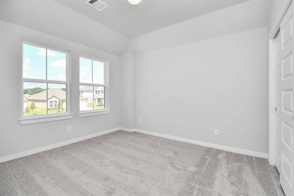 Sample photo of completed home with similar floor plan. Actual colors and selections may vary.