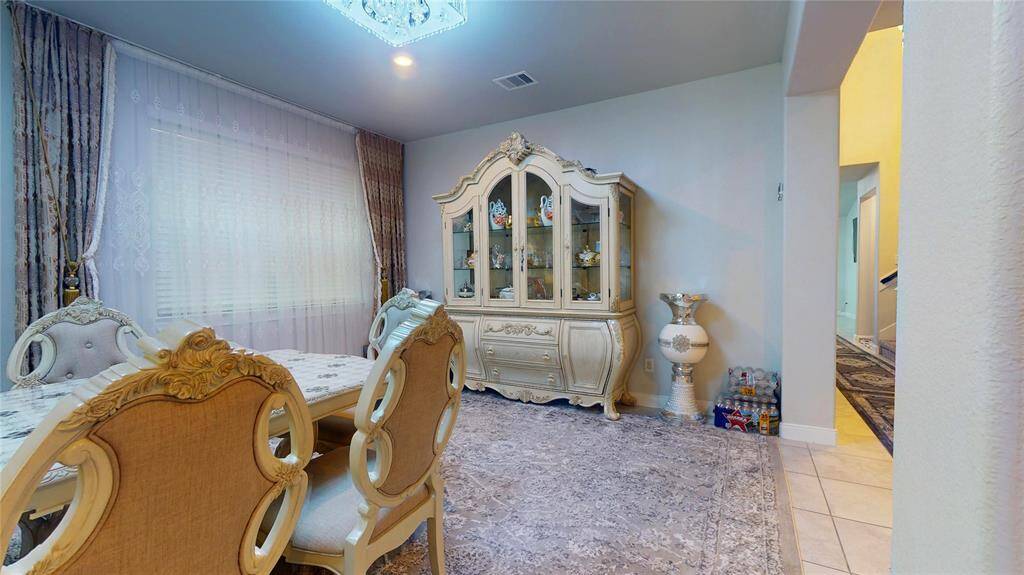 Beautifully draped windows enhance the homes elegance, complemented by carefully selected rugs that add warmth and character’s. A furniture option is considered for buyers seeking a move-in-ready experience. Select pieces may be included.