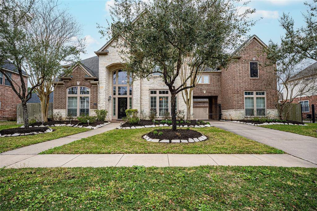 Experience luxury living with this stunning home featuring 5 spacious bedrooms, 4.5 bathrooms, and a 3-car detached garage, all adorned with exquisite interior details.