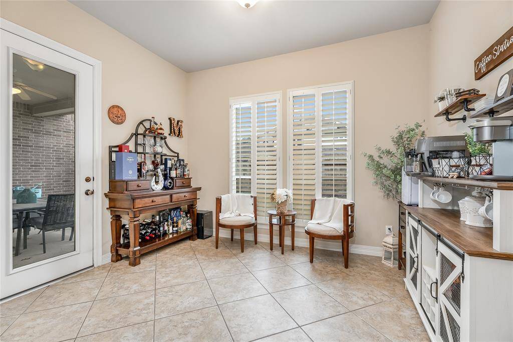 Transform this versatile sunroom into your ideal space. Whether it's a cozy reading nook, a coffee station, or an arts and crafts area, the possibilities are endless.