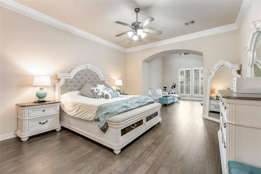 Experience the ultimate in luxury with this exquisite primary suite, featuring a cozy sitting area, a spa-like bathroom, and a charming loft. A truly unique retreat.