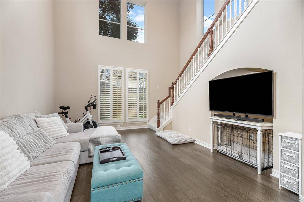 Unwind in this serene primary room sitting area, perfect for relaxation after a busy day.