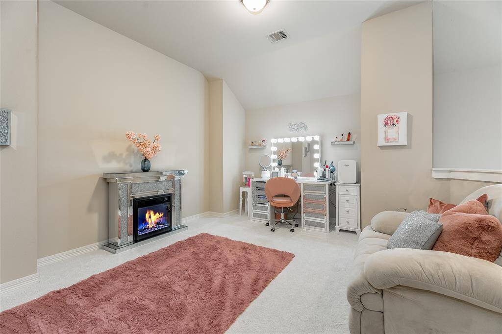 Discover your personal sanctuary in this unique loft space above the primary bedroom—an ideal oasis to create your own paradise.