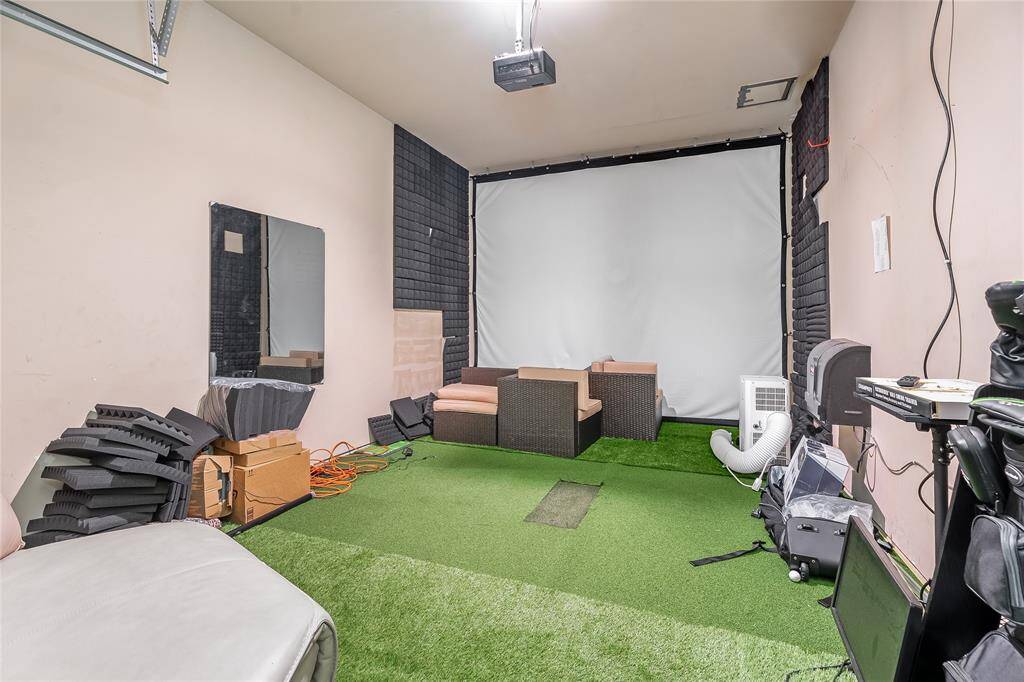 Transform the garage space into your dream man cave or hobby workshop.