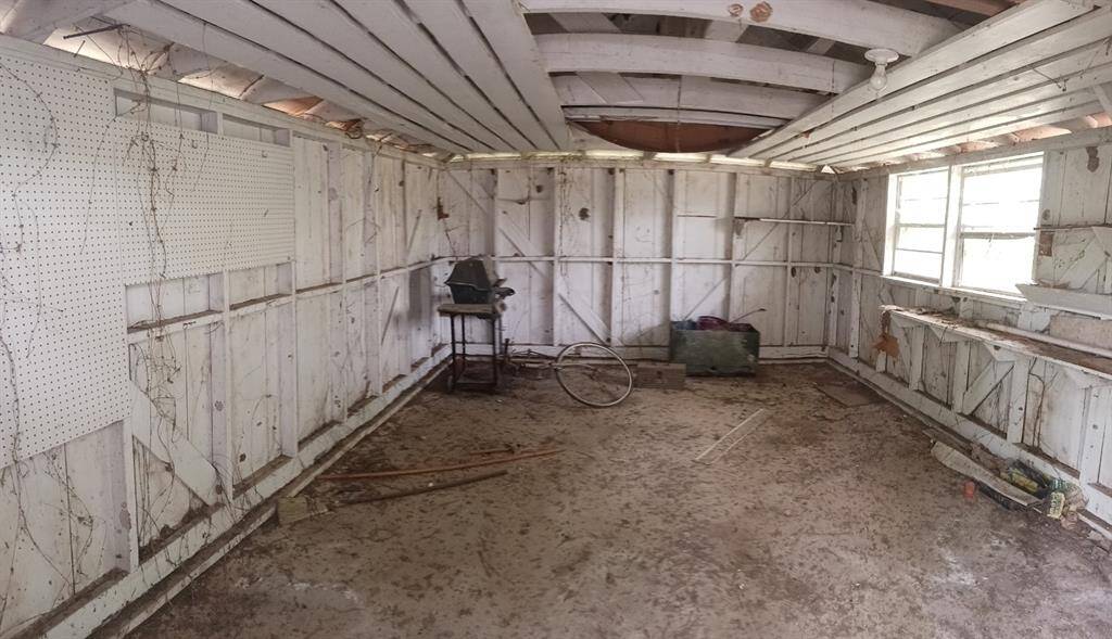 Inside of small shed on property.