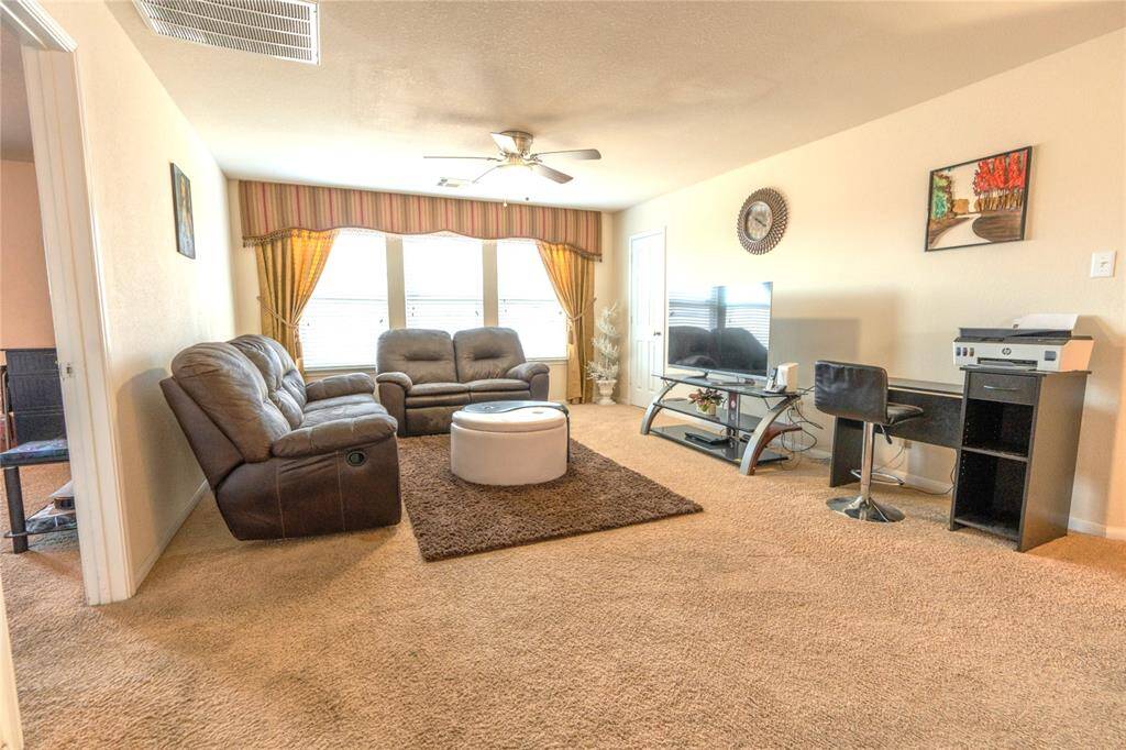 Spacious second-floor game room, perfect for entertainment and relaxation.