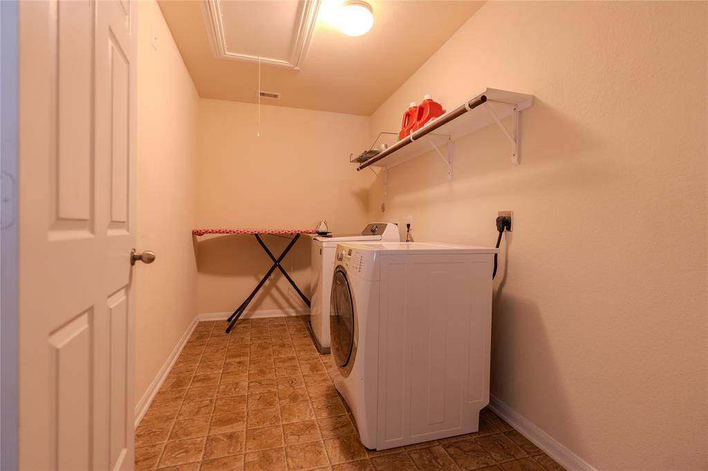 Spacious second-floor utility room.