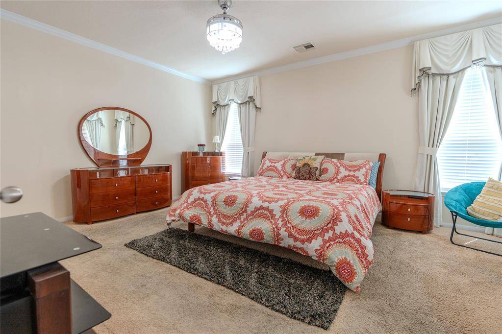 Experience convenience and luxury with the primary bedroom located on the main floor.