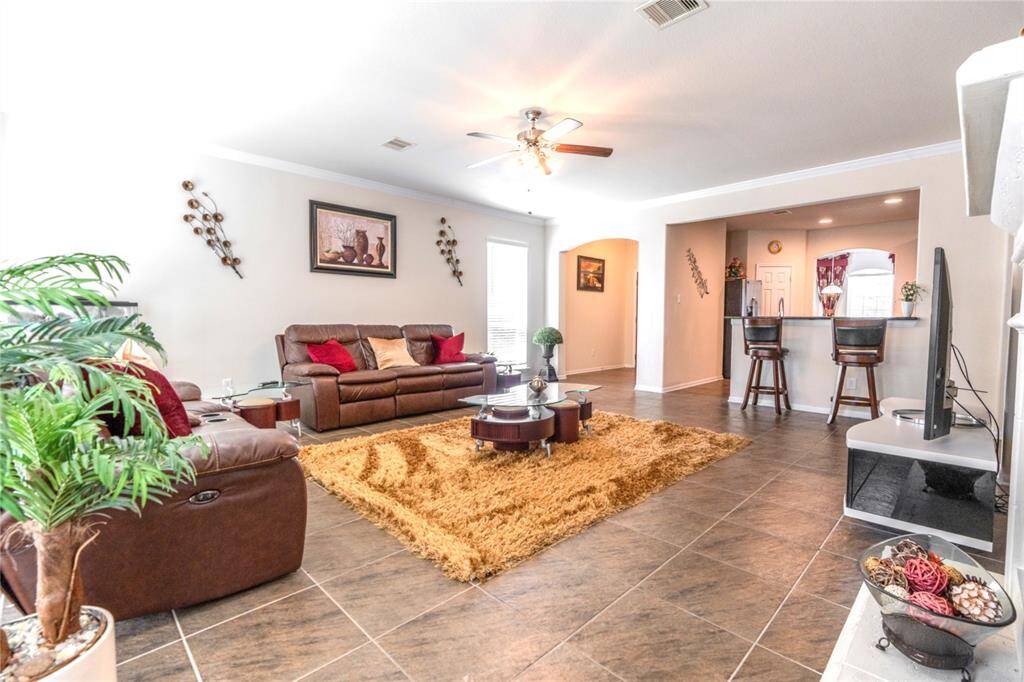 Inviting family room with direct front door access, perfect for welcoming guests.