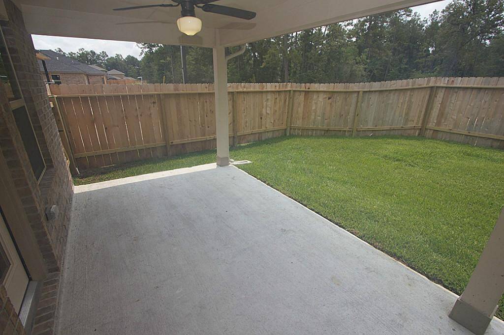 A large covered back porch.