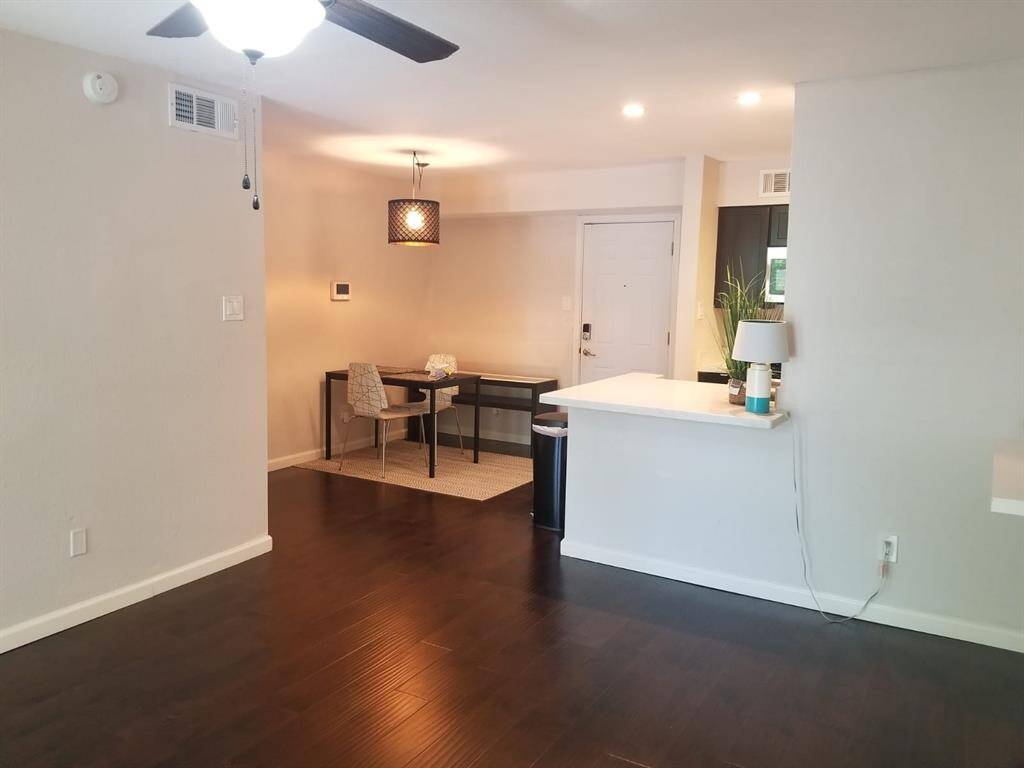 Beautiful Wood floors throughout entire unit. This is the living area.