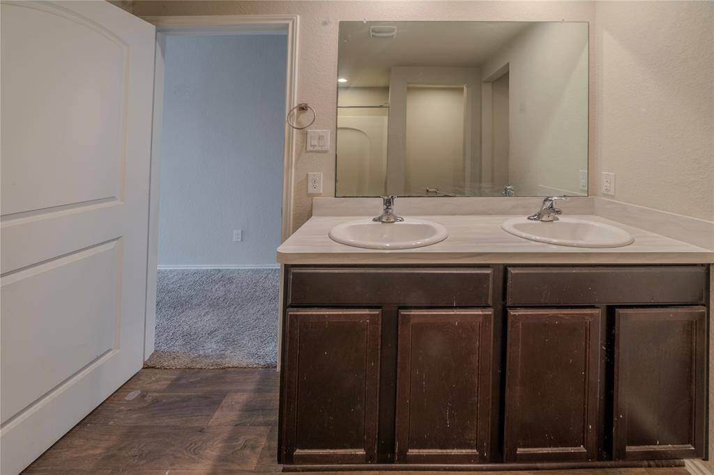 Double sinks in principal bathroom.
