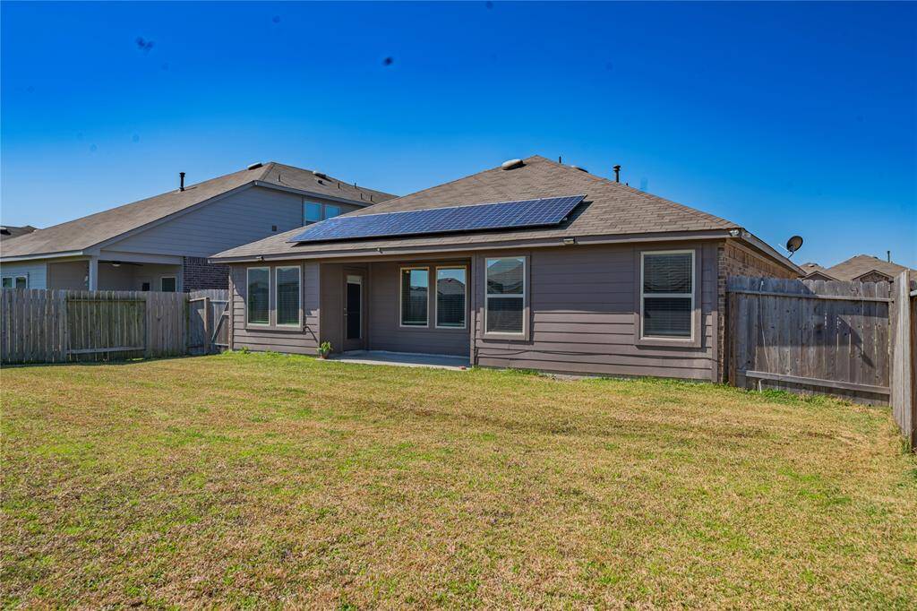 Plenty of yard space, solar panels convey with the sale of the property, low electric bills!