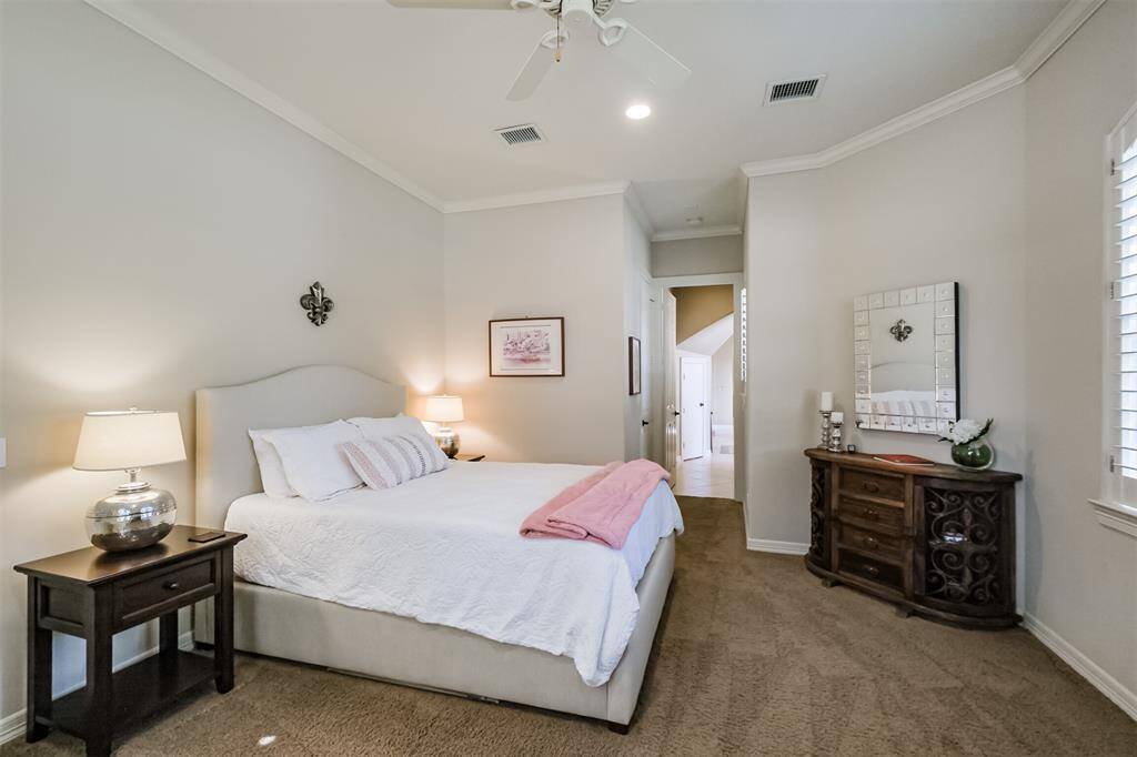 The en-suite bathroom entrance is situated to the left of the door.
