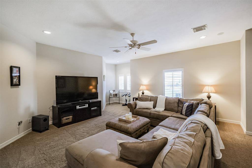 The TV/movie room could be an oversized 7th bedroom! Large enough for extensive sectional seating, this space makes the ideal place for a teenage hangout or family movie night.