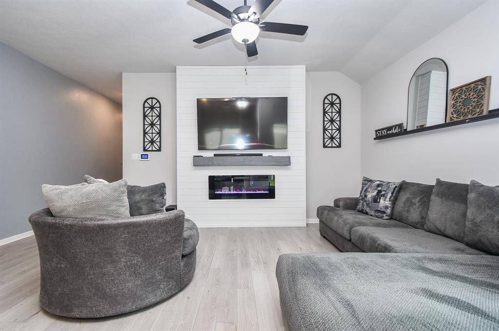 A modern and cozy living room with a neutral color scheme ready for your creativity.