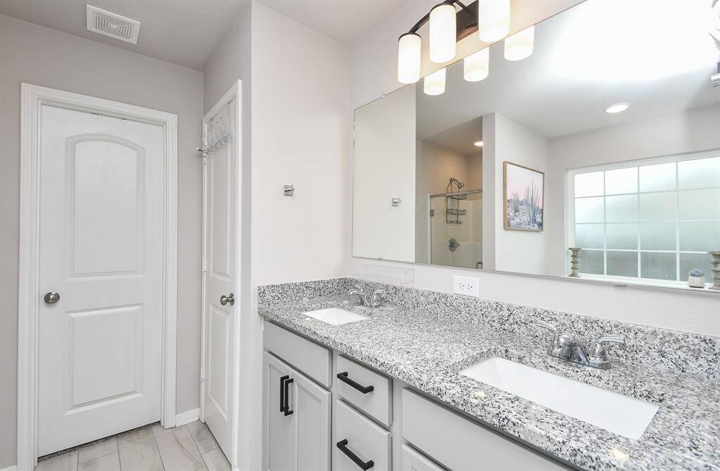 Dual vanity with ample counter space.
