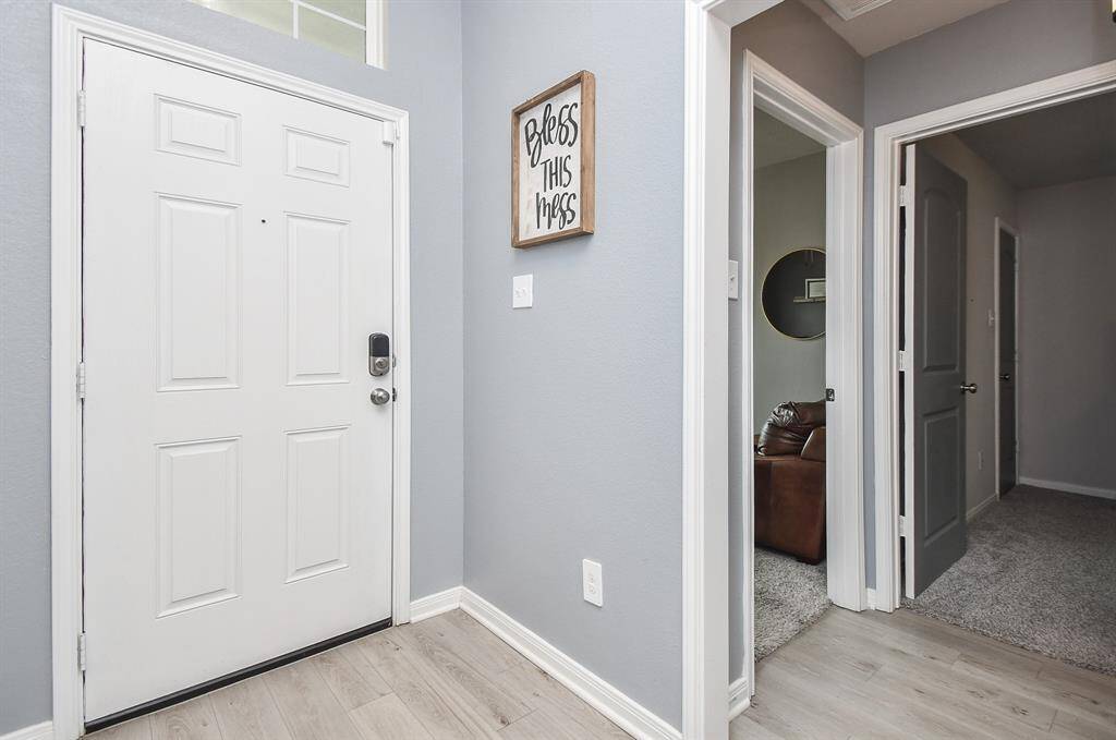 Welcome home to 915 Acorn Trail Place located in a quaint community in close proximity to Old Tomball.