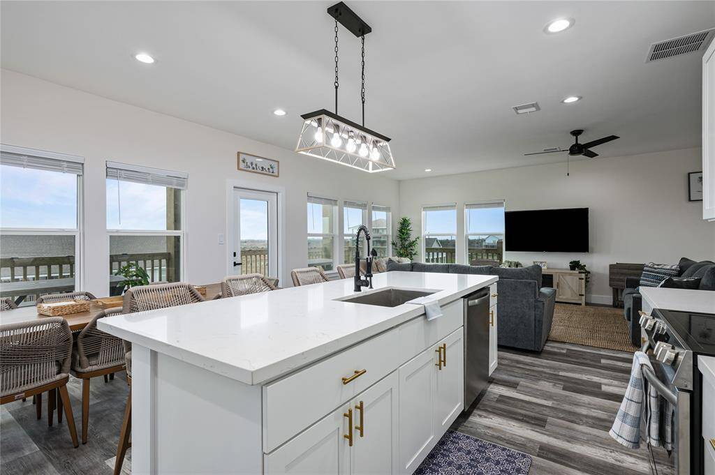 Enjoy the quartz countertops and stainless steel appliances.