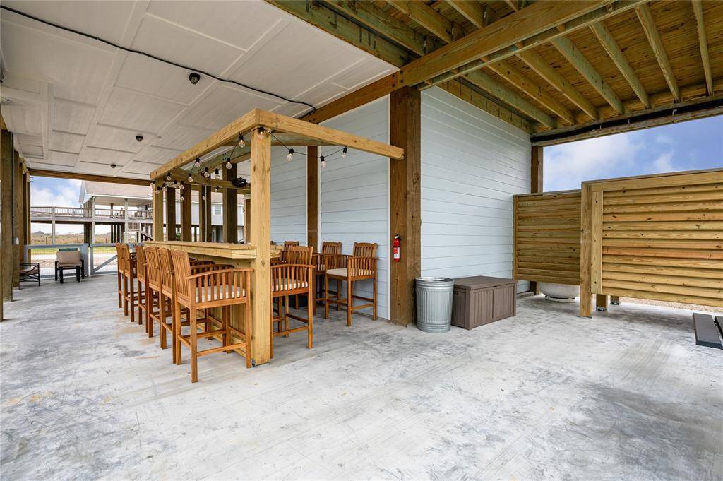 The tall ground floor provides a shady space for all the beachy outdoor fun you can imagine.