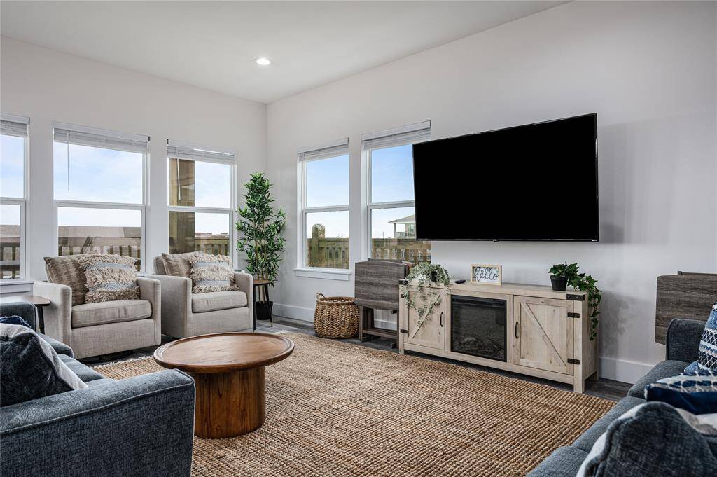 the spacious living room provides plenty of space to enjoy each others' company.
