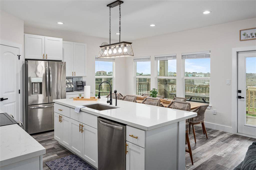 The bank of east-facing windows provides fantastic natural light and brings the outdoors in.