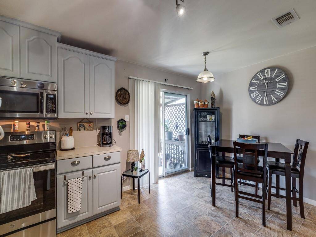 This is a view of the kitchen and the adjacent breakfast room.