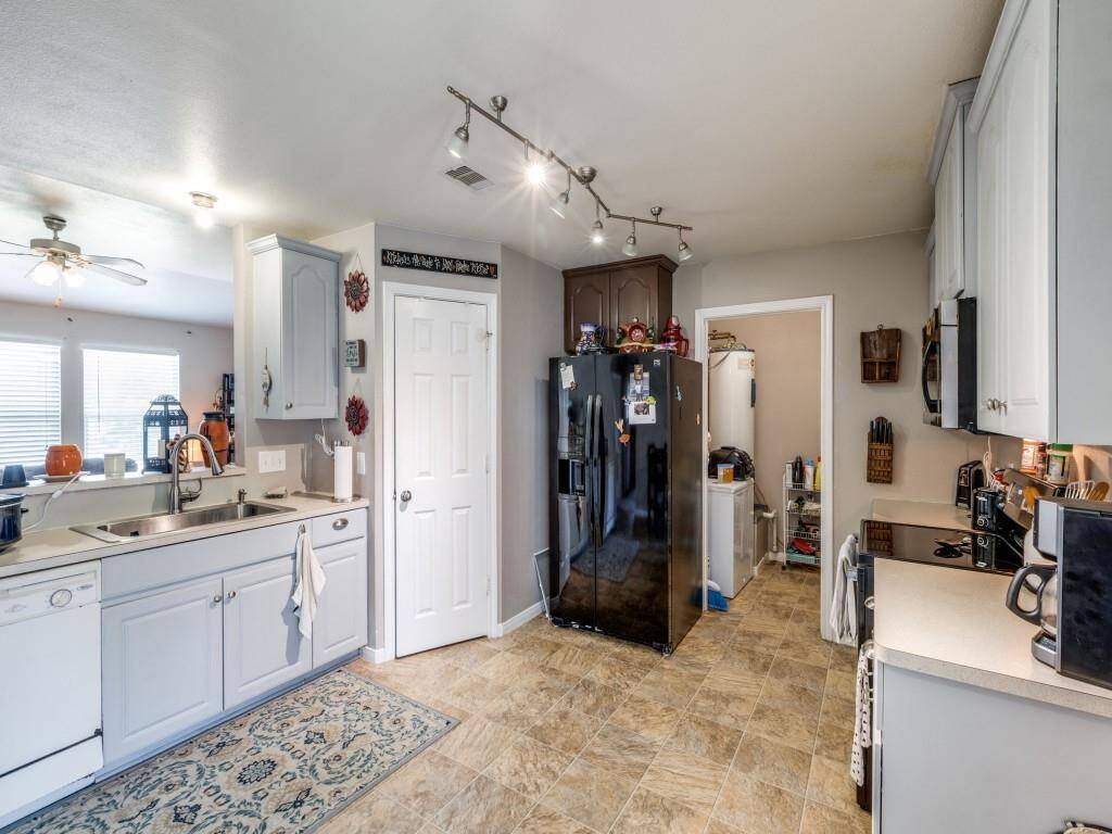 A picture of the open floor plan from the kitchen with a view of the living room.