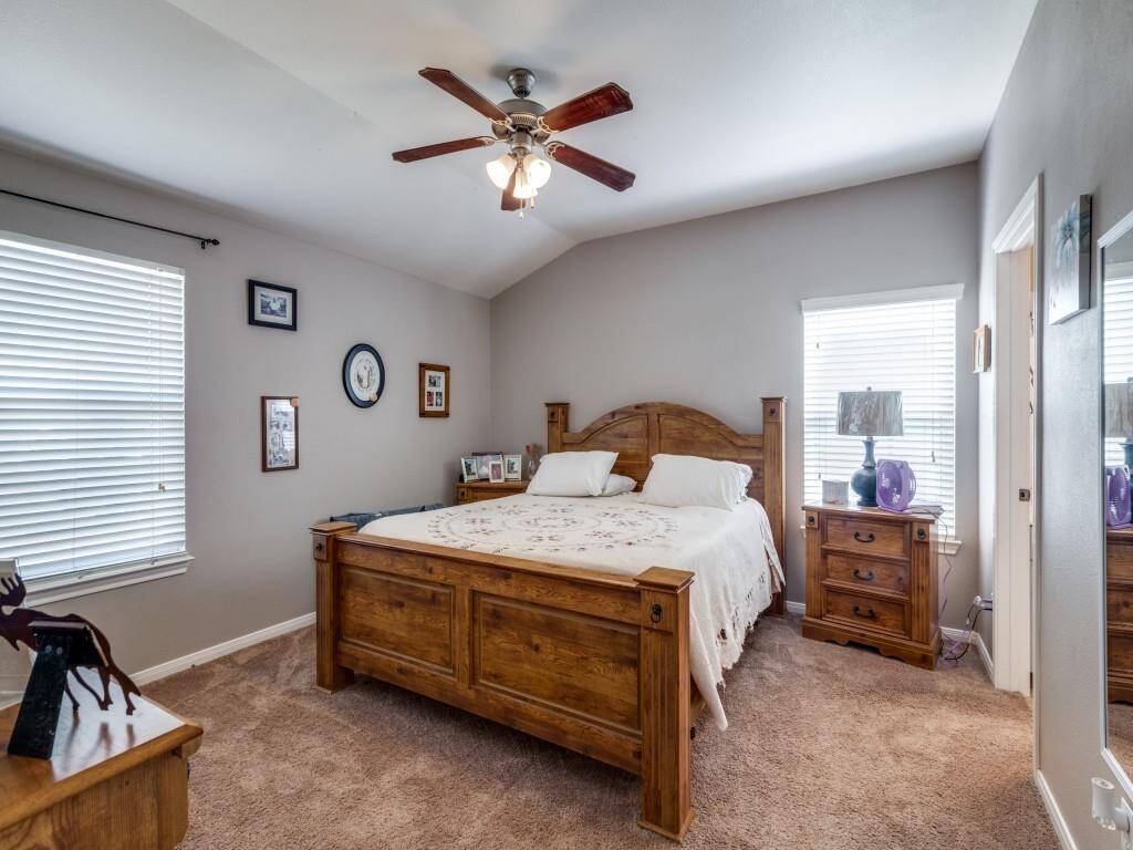 "The master bedroom is spacious and receives ample natural light.