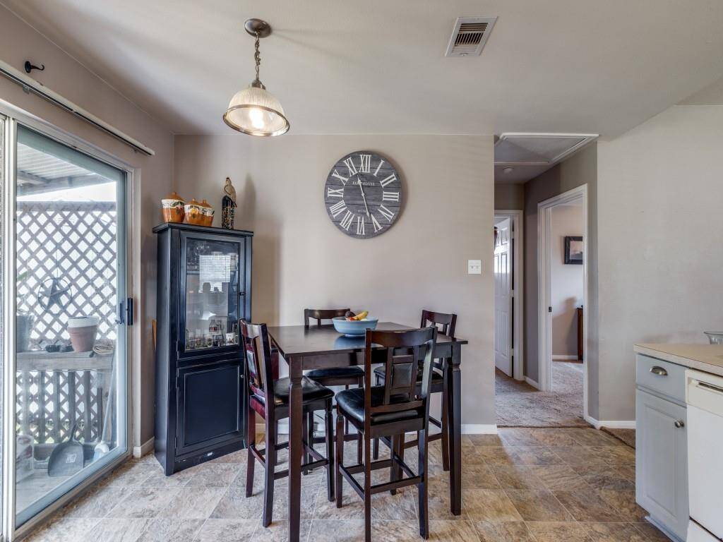 There is a lot of natural light entering the breakfast room.