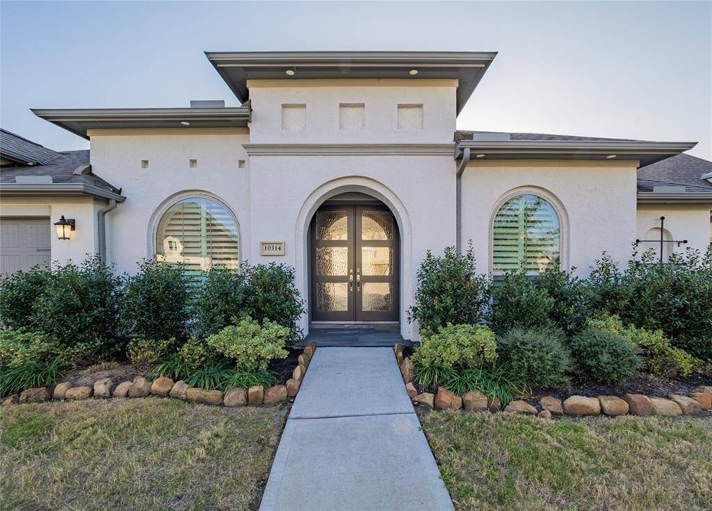 Welcome home 10314 Granite in award winning Meridiana subdivision in Iowa Colony also known as Rosharon, Beautiful double doors which are glass and metal