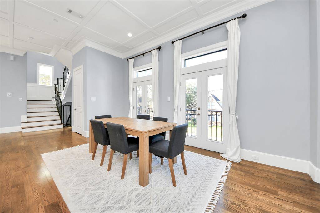 Make memories gathered around the table with your family and friends! This spacious dining room features elegant flooring, custom paint, and adjacent to family room and kitchen for open concept feel.