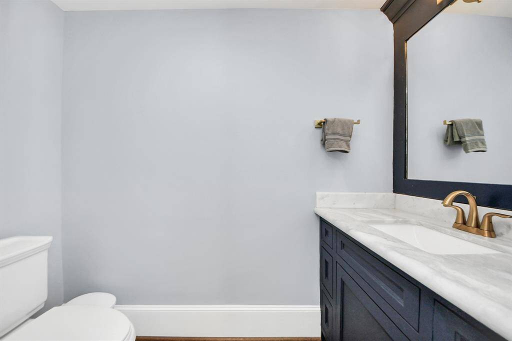 Half bath, located on second floor.