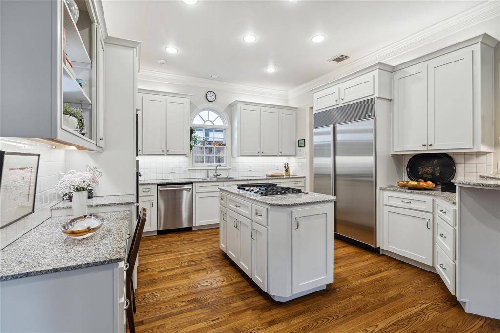 Island kitchen with stainless steel appliances
