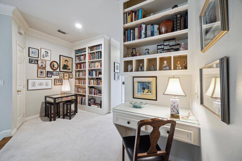 Built-in desk and bookcases at the 2nd floor stair landing