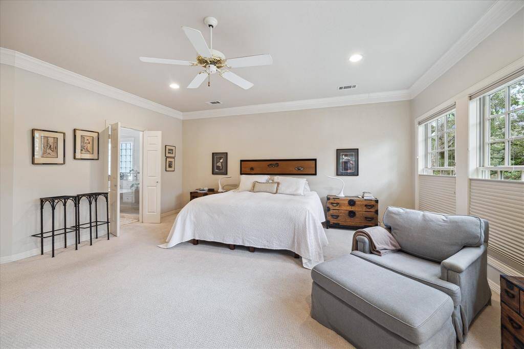 Another view of primary bedroom