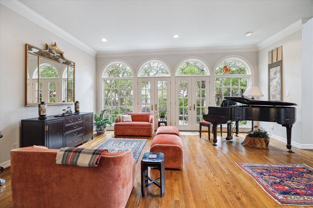 Formal living with French doors that open to your private gated patio
