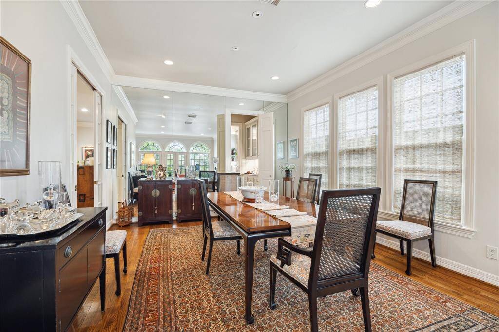 The dining room can be closed off from the den and butler's pantry for a more intimate feeling