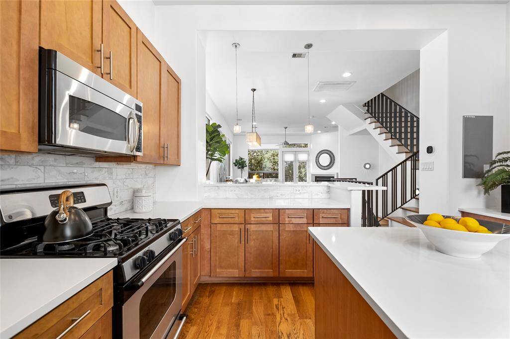 Gas range with external venting range hood.