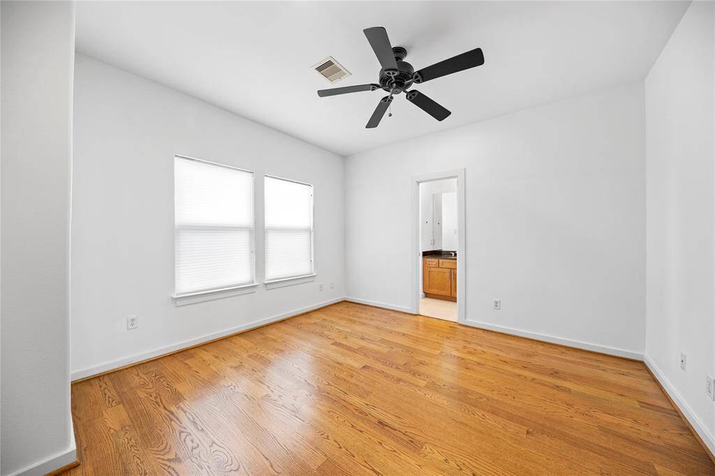Secondary bedroom on the 3rd floor. All bedrooms are a good size. This one is 13'x13'.
