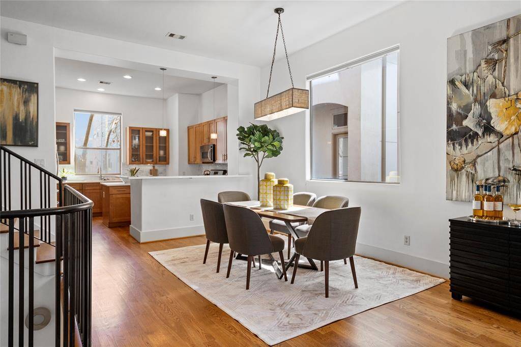 Comfortable dining area open to both kitchen and living for easy entertaining.