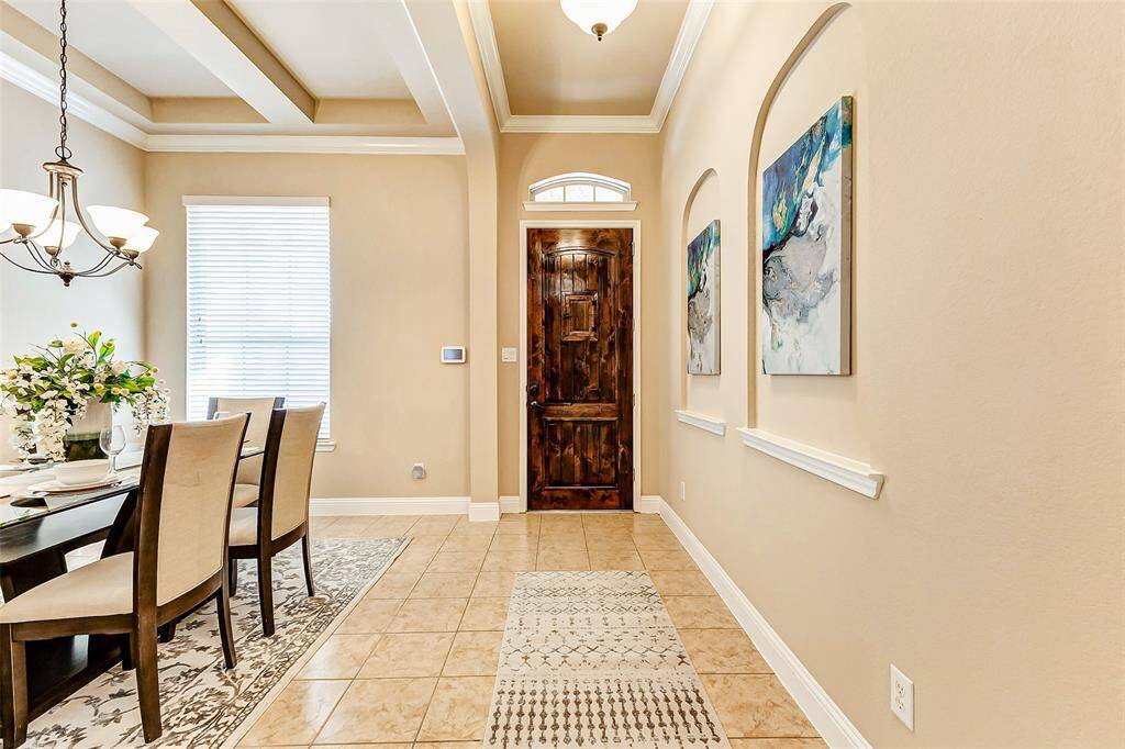 Elegant foyer with high ceilings welcomes you