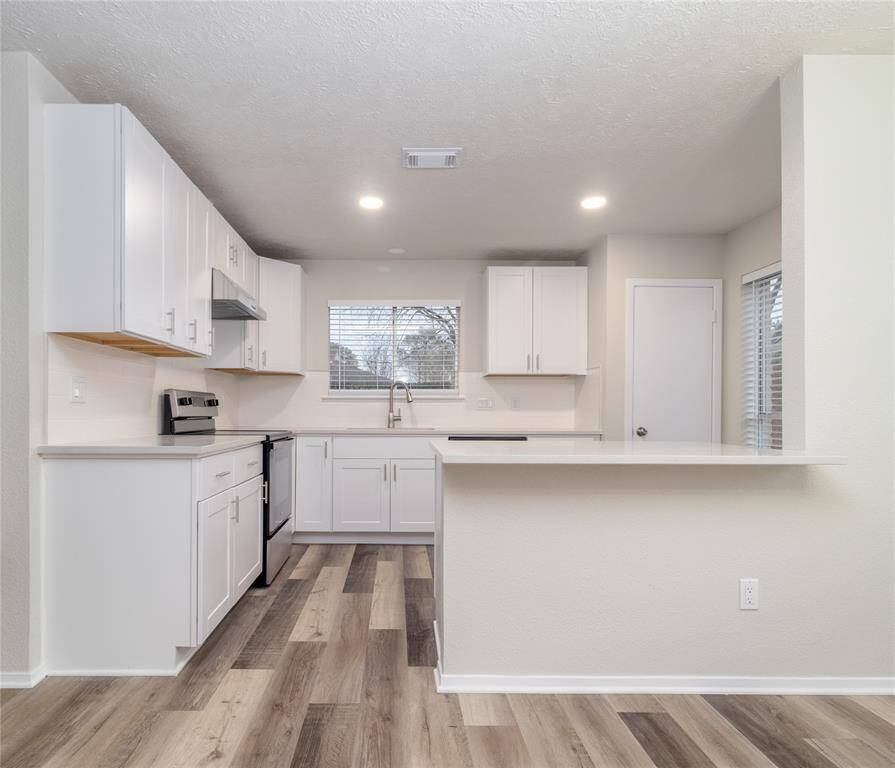Kitchen has been updated with Granite counter tops and subway back splash.