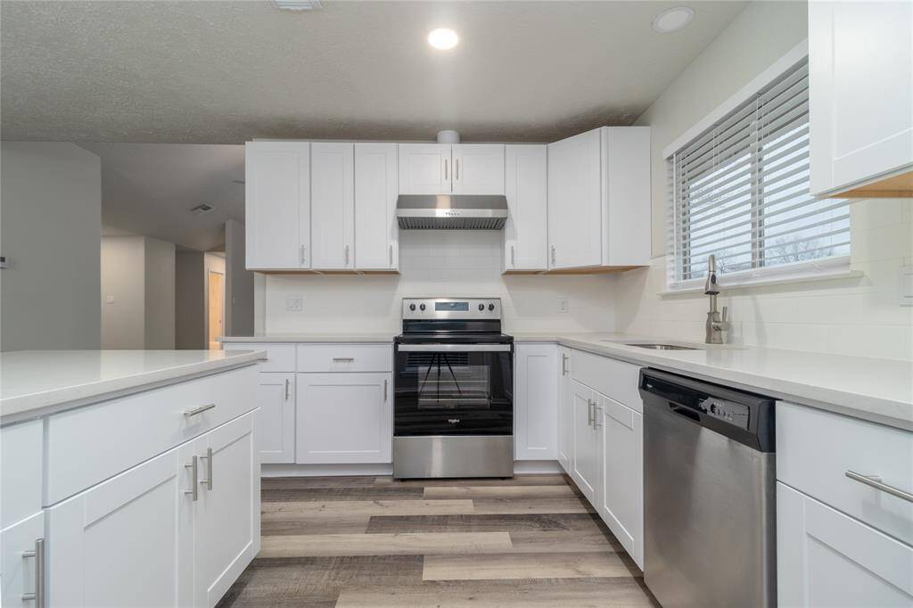 Kitchen has new stainless steel Appliances, stove and Dishwasher with all new cabinets.