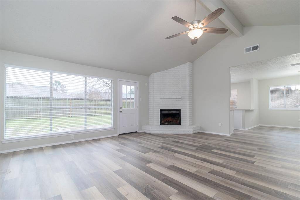 Large Living Room with a wood burning fireplace.