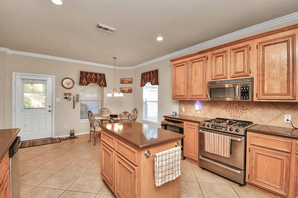 Large open Kitchen to living room. Chefs delight with gas range.