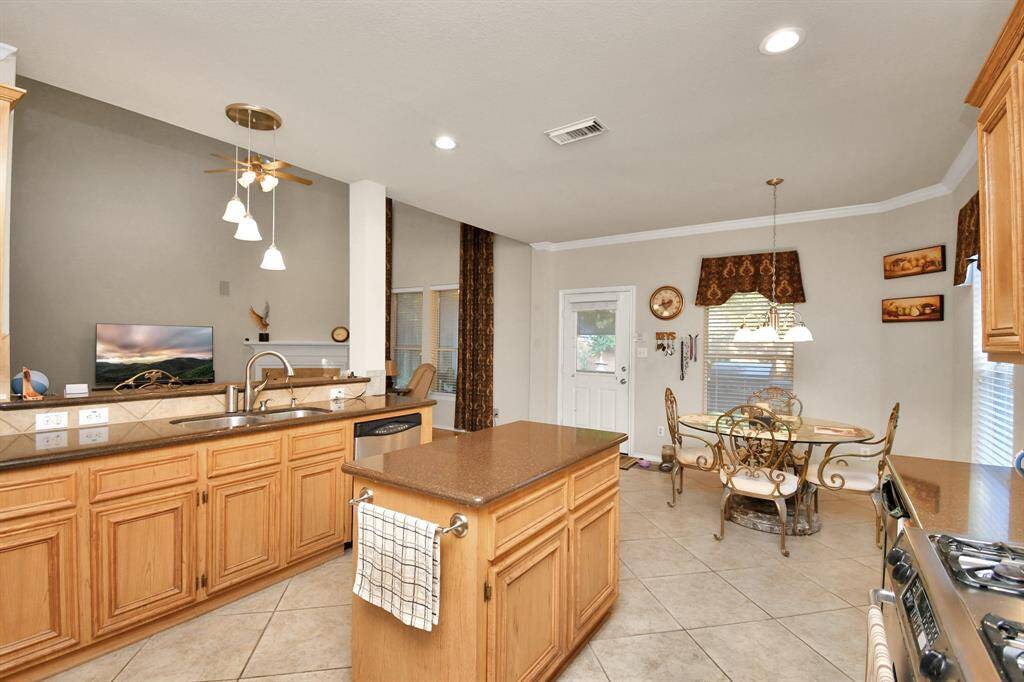 Another view of kitchen and breakfast room