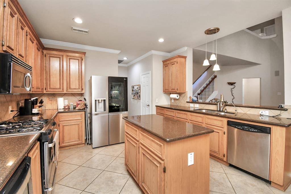 Gas stove & oven.  New LG refrigerator included