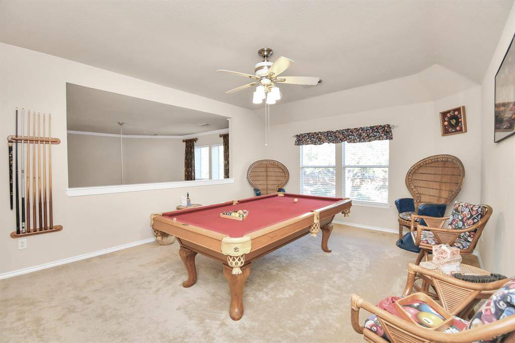 Game room over looks living area